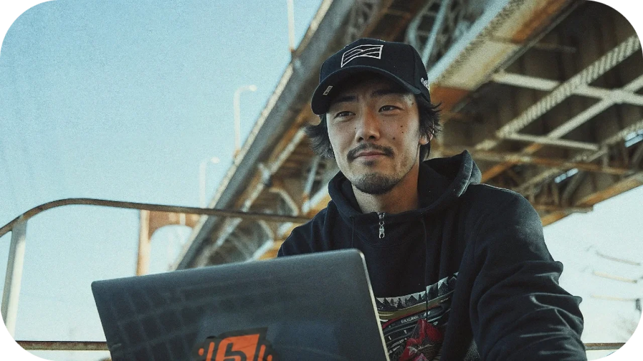 A Chinese Professional Using Laptop Hero Mobile