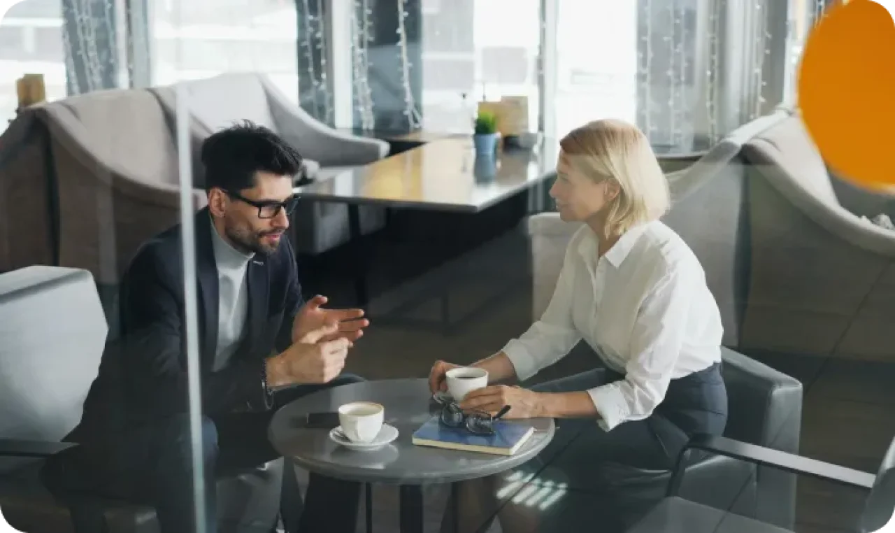 A man and a woman sitting at a table