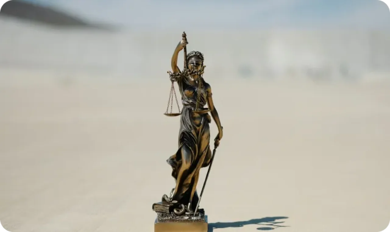 Statue Of Lady Justice Holding Scale