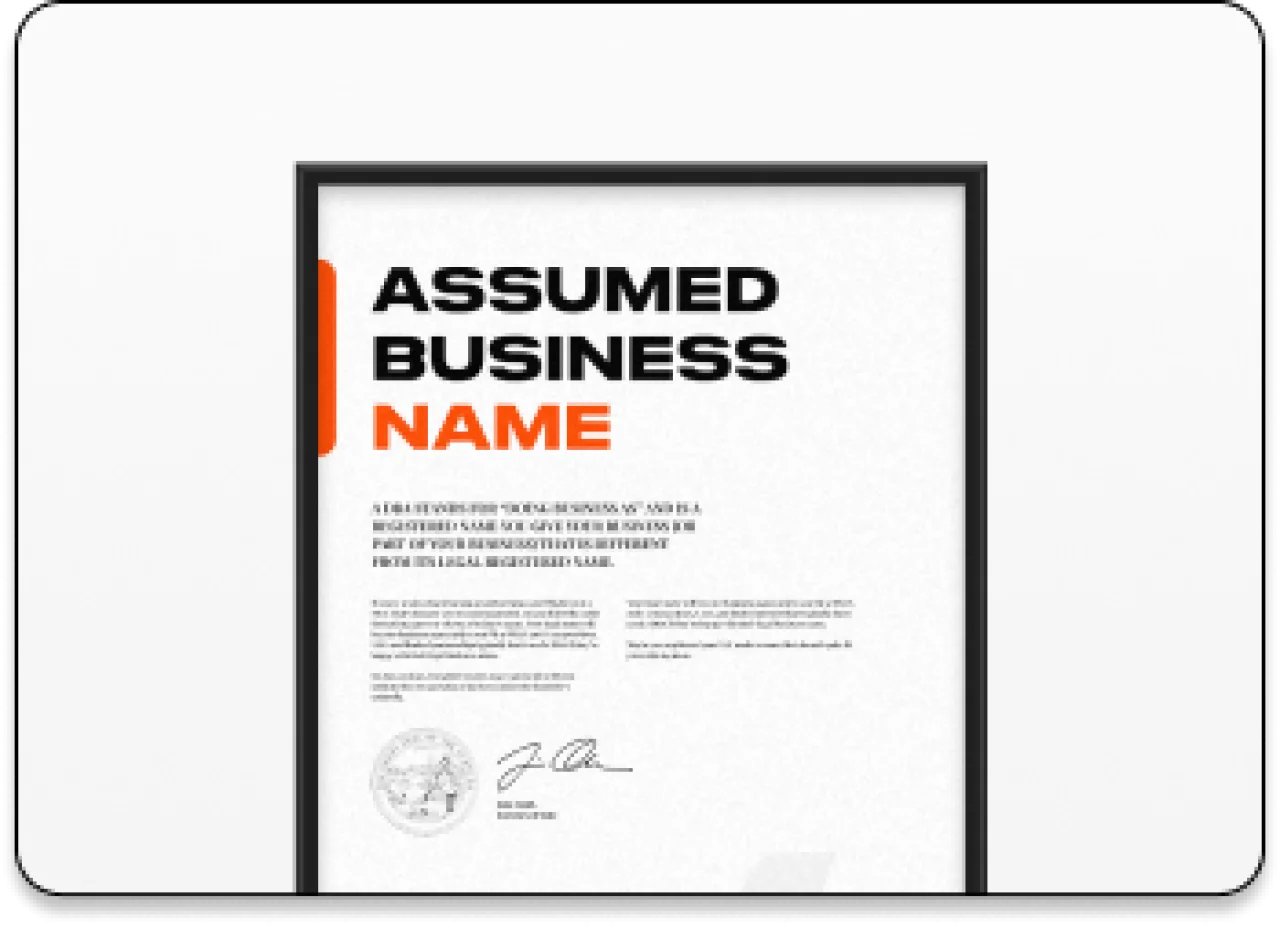Framed certificate labeled “Assumed Business Name,” illustrating a DBA (Doing Business As) registration for operating under a name different from a legal business name.