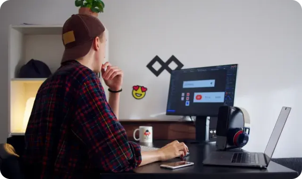 Designer working on ux ui project at desk